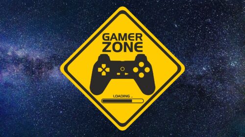 Gelbes Schild mit einer schwarzen illustrierten Spielkonsole und der Aufschrift "Gamer Zone Loading"