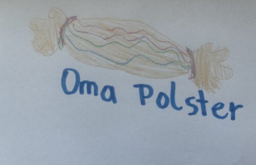 ein Polster und darunter steht "Oma Polster"